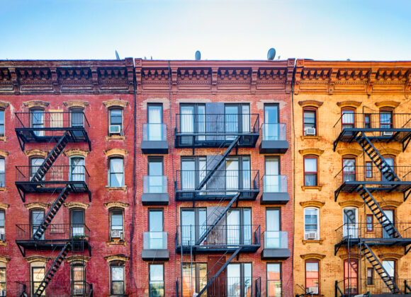 Fire Escape Ladders And Your Home Top stories of colorful Williamsburg apartment buildings with steel fire escape stairways